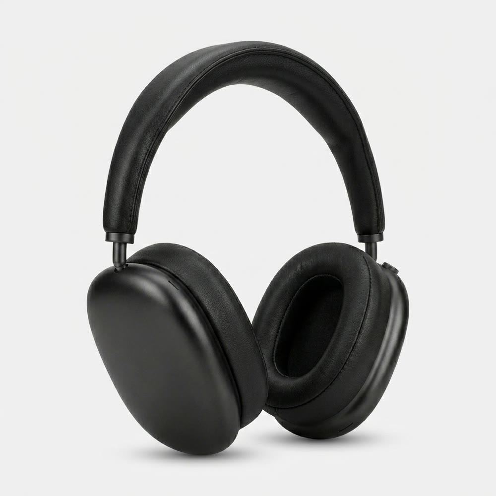 Black over-ear headphones photographed three-quarter on a white studio ground.